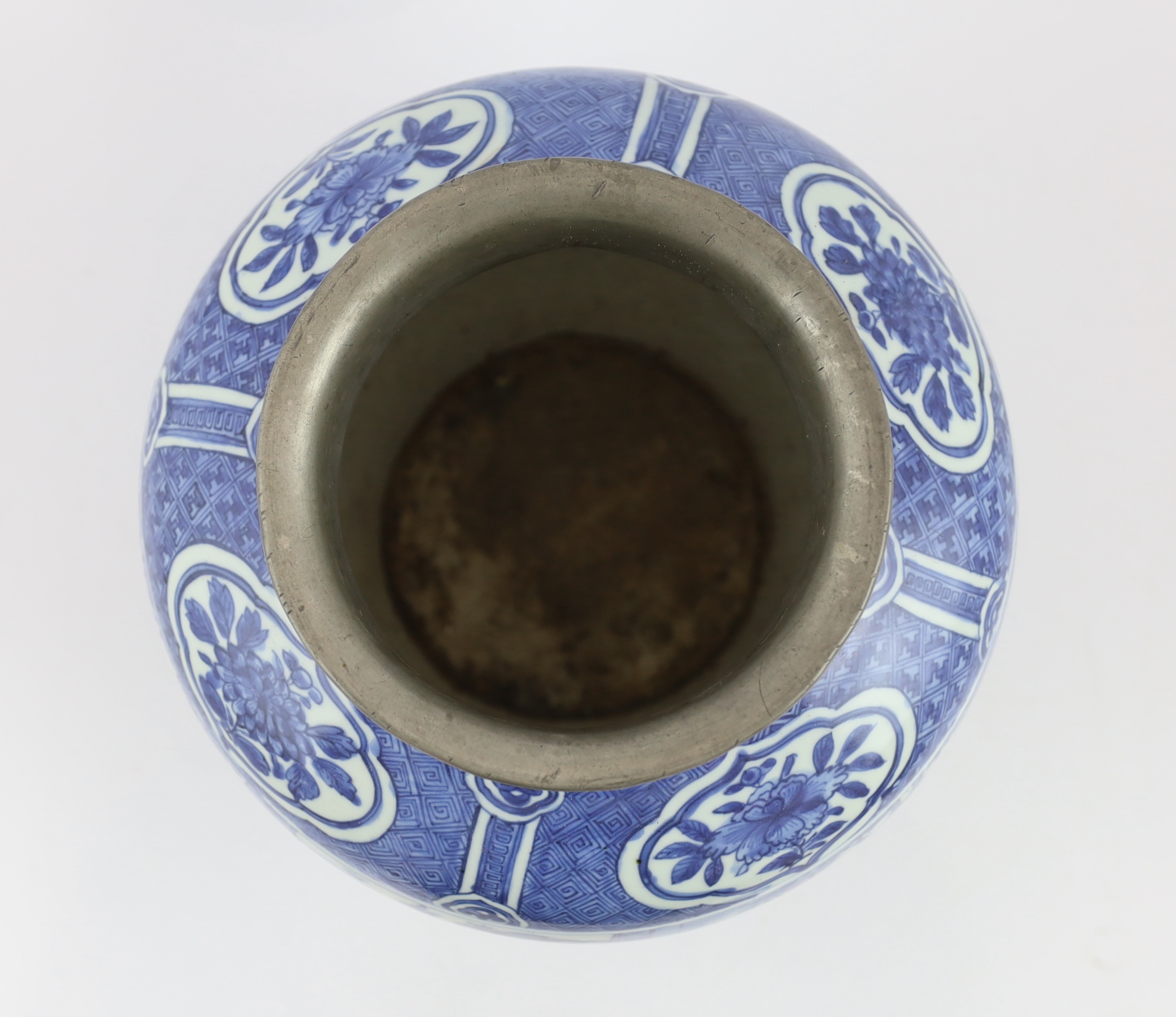 A Chinese Ming blue and white ‘scholars’ jar, guan, Wanli period (1572-1620), broken around base and restuck